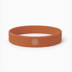 Orange wristband with a sun logo on a white background