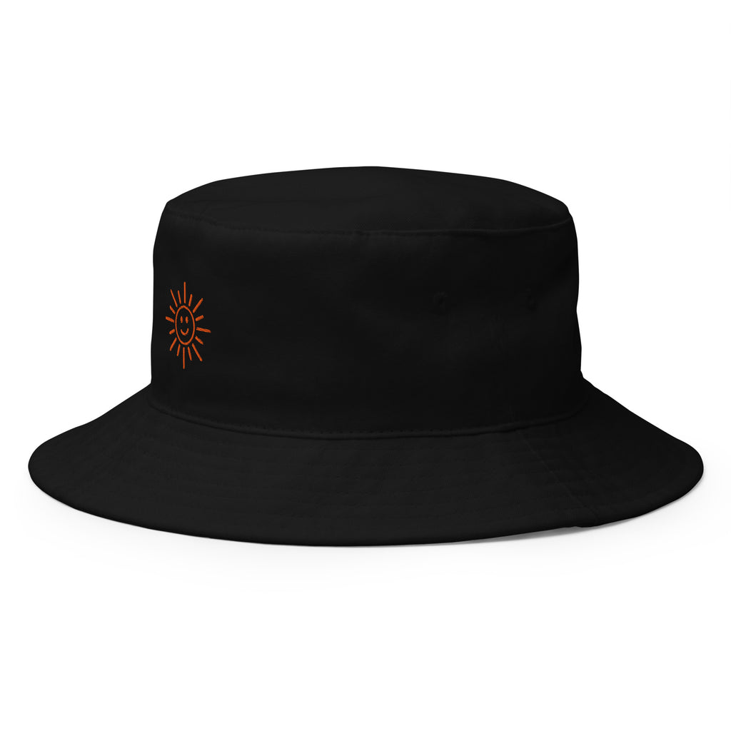 The Sunshine Project cotton bucket hat in black, angled front view