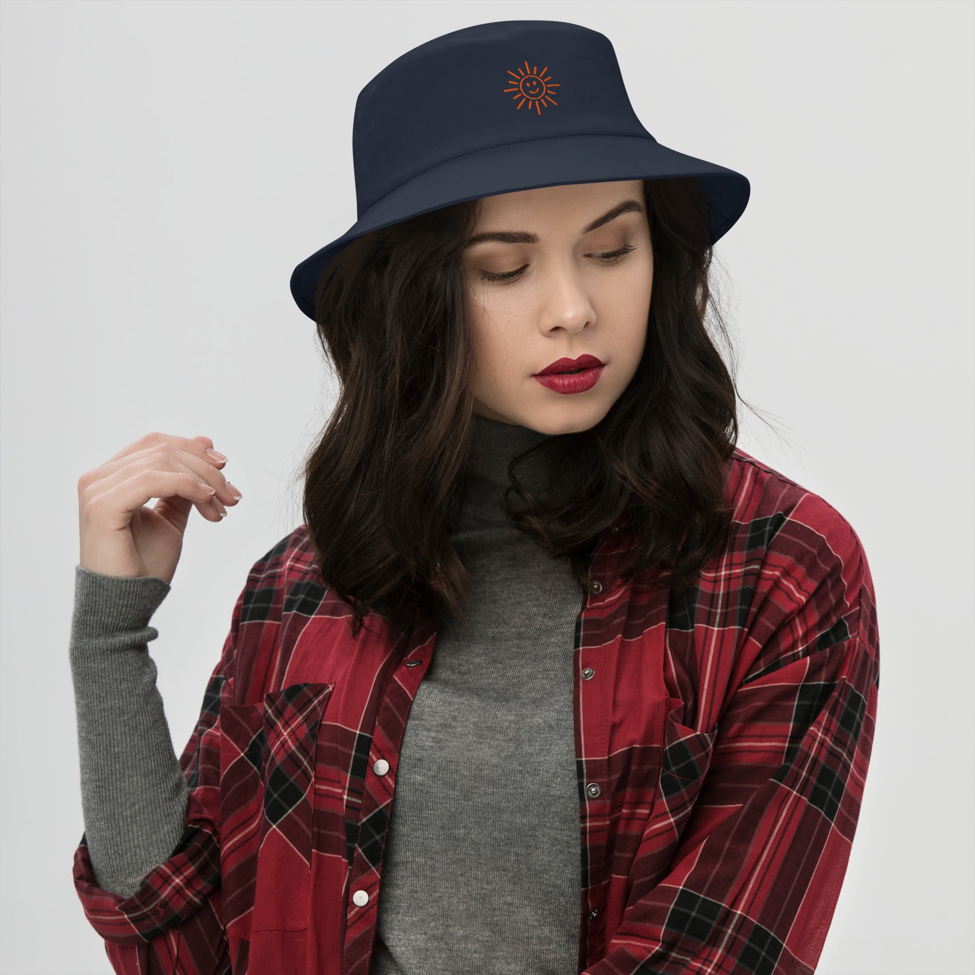 The Sunshine Project cotton bucket hat in navy, front view