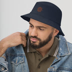 The Sunshine Project cotton bucket hat in navy, angled front view