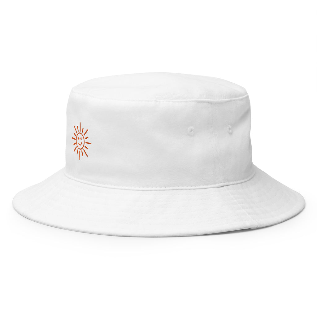The Sunshine Project cotton bucket hat in white, angled front view