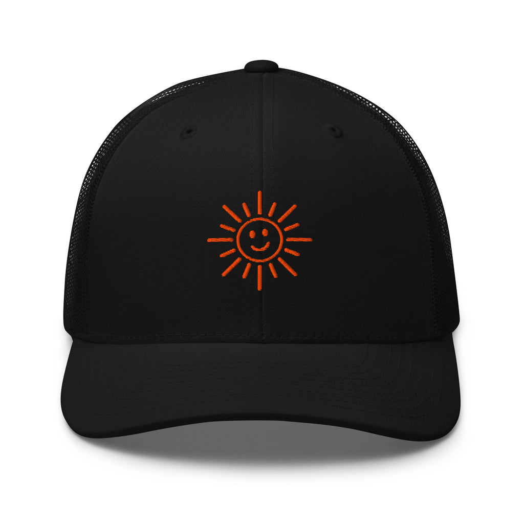 The Sunshine Project mesh-back trucker hat in black, front view