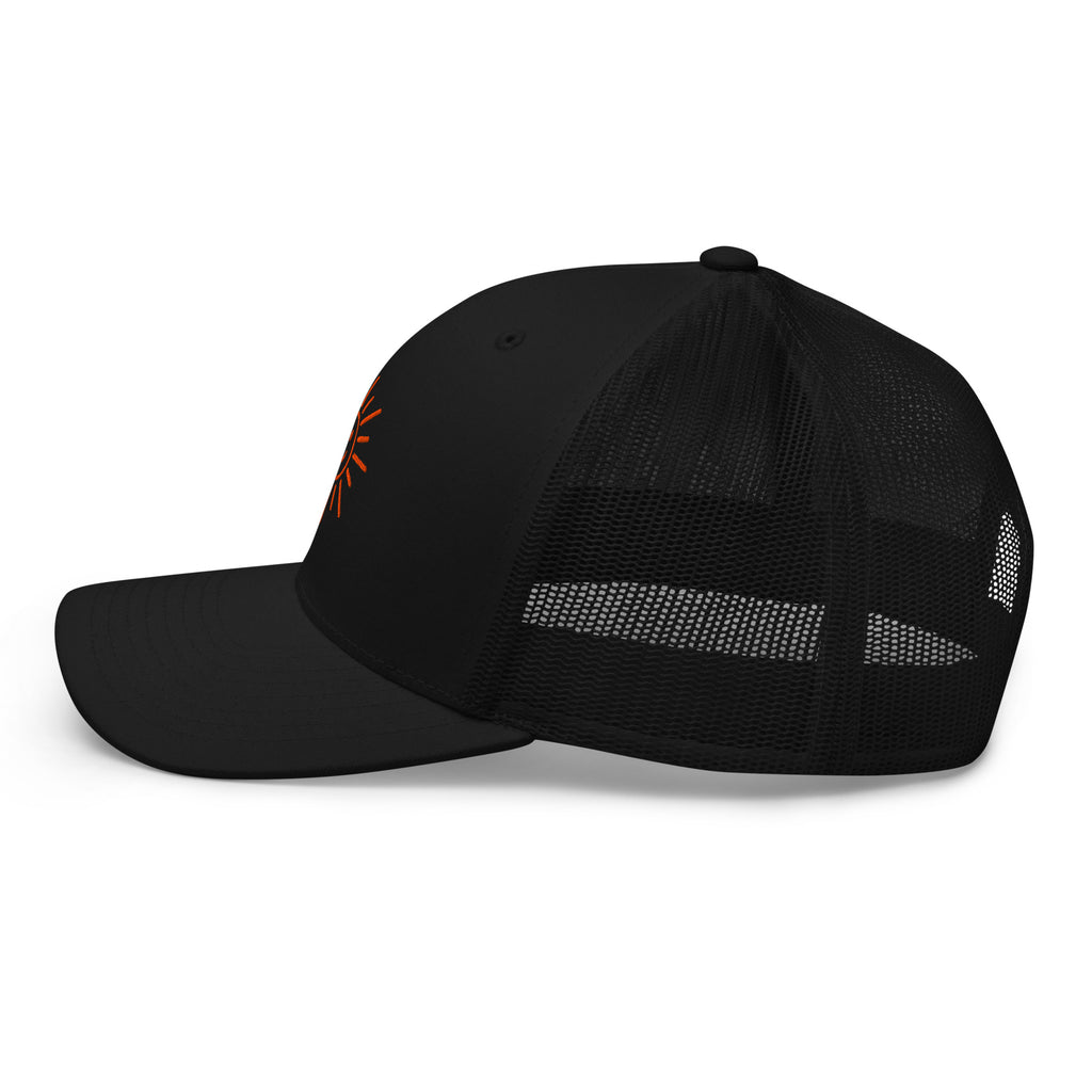 The Sunshine Project mesh-back trucker hat in black, left side view