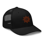 The Sunshine Project mesh-back trucker hat in black, angled front view