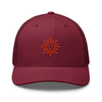 The Sunshine Project mesh-back trucker hat in cranberry red, front view
