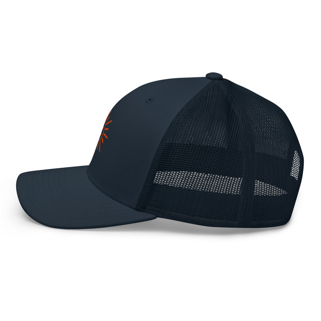 The Sunshine Project mesh-back trucker hat in navy, left side view