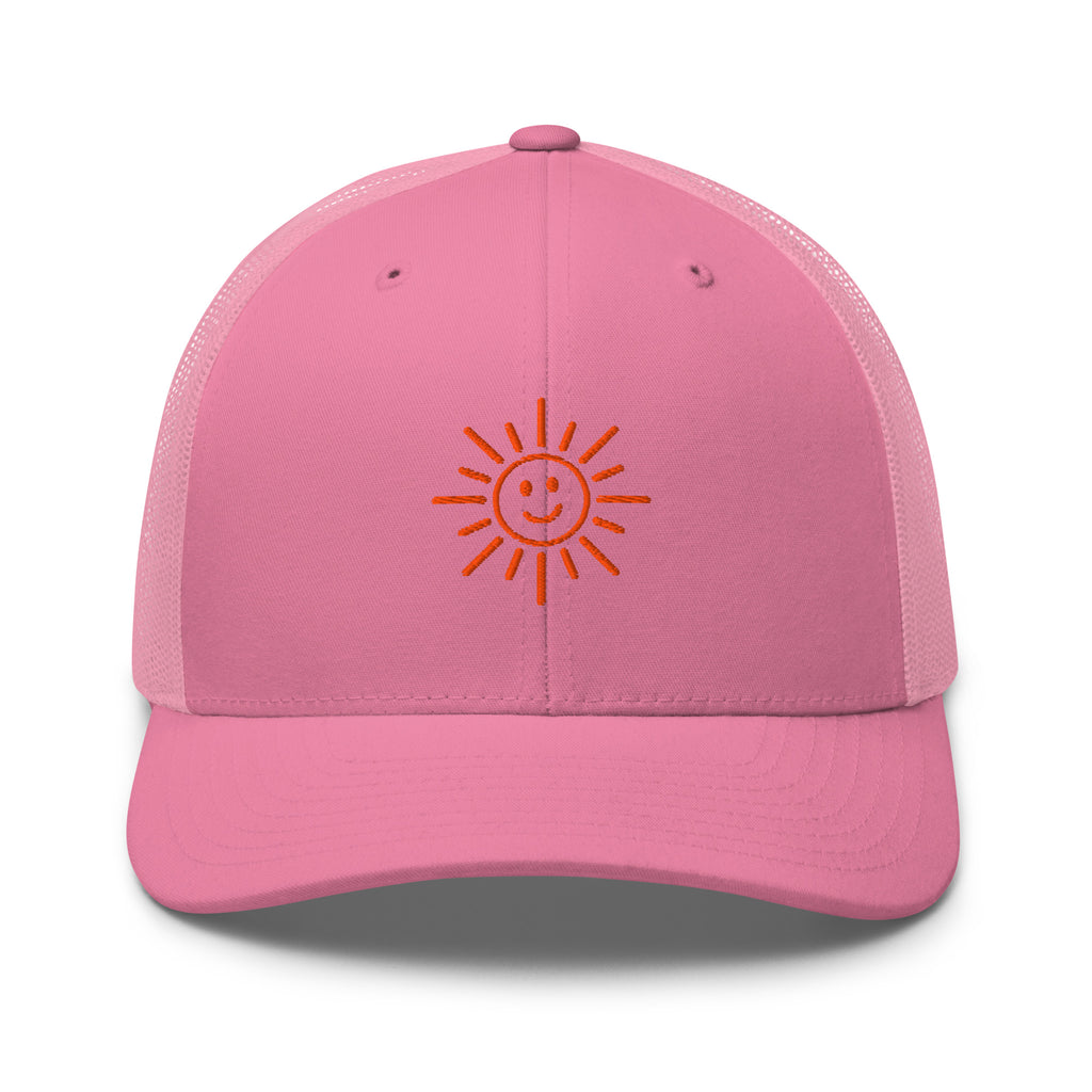 The Sunshine Project mesh-back trucker hat in pink, front view