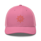 The Sunshine Project mesh-back trucker hat in pink, front view