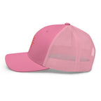 The Sunshine Project mesh-back trucker hat in pink, left side view