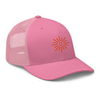 The Sunshine Project mesh-back trucker hat in pink, angled front view