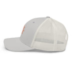 The Sunshine Project mesh-back trucker hat in silver, left side view