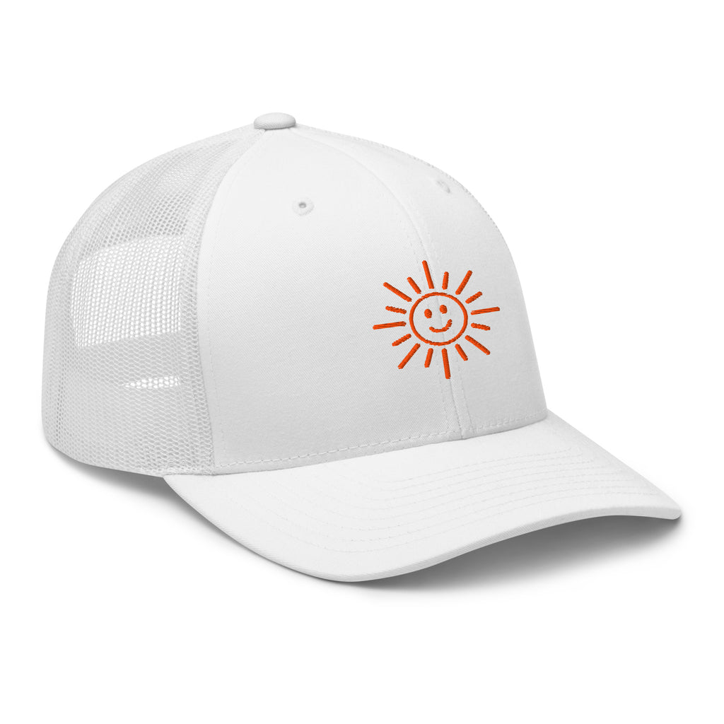 The Sunshine Project mesh-back trucker hat in white, angled front view
