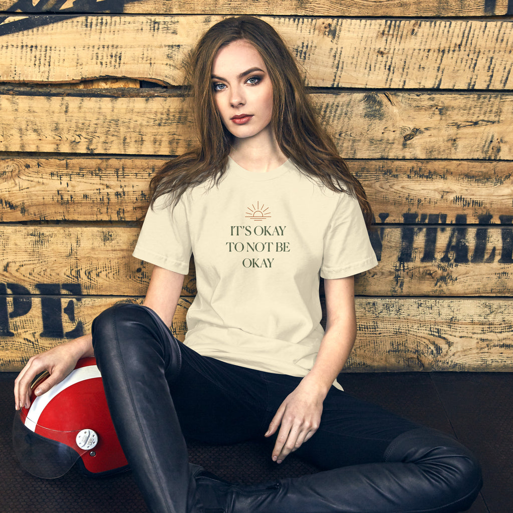 The Sunshine Project It's Okay to Not Be Okay tee in natural, front view