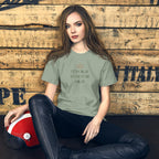 The Sunshine Project It's Okay to Not Be Okay tee in sage green, front view