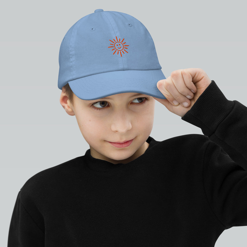The Sunshine Project youth baseball cap in Blue, front view