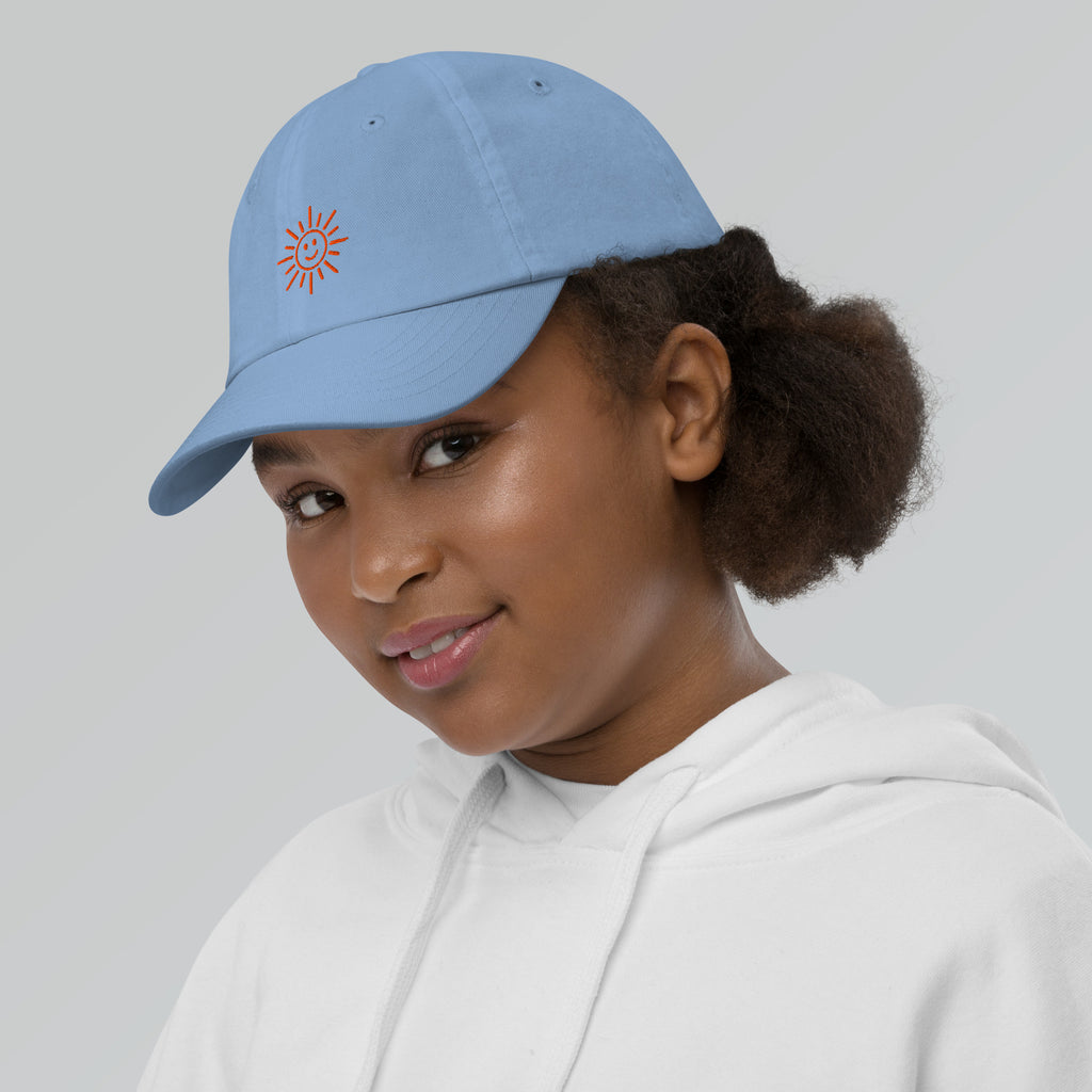The Sunshine Project youth baseball cap in Blue, left side view