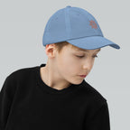 The Sunshine Project youth baseball cap in Blue, right side view