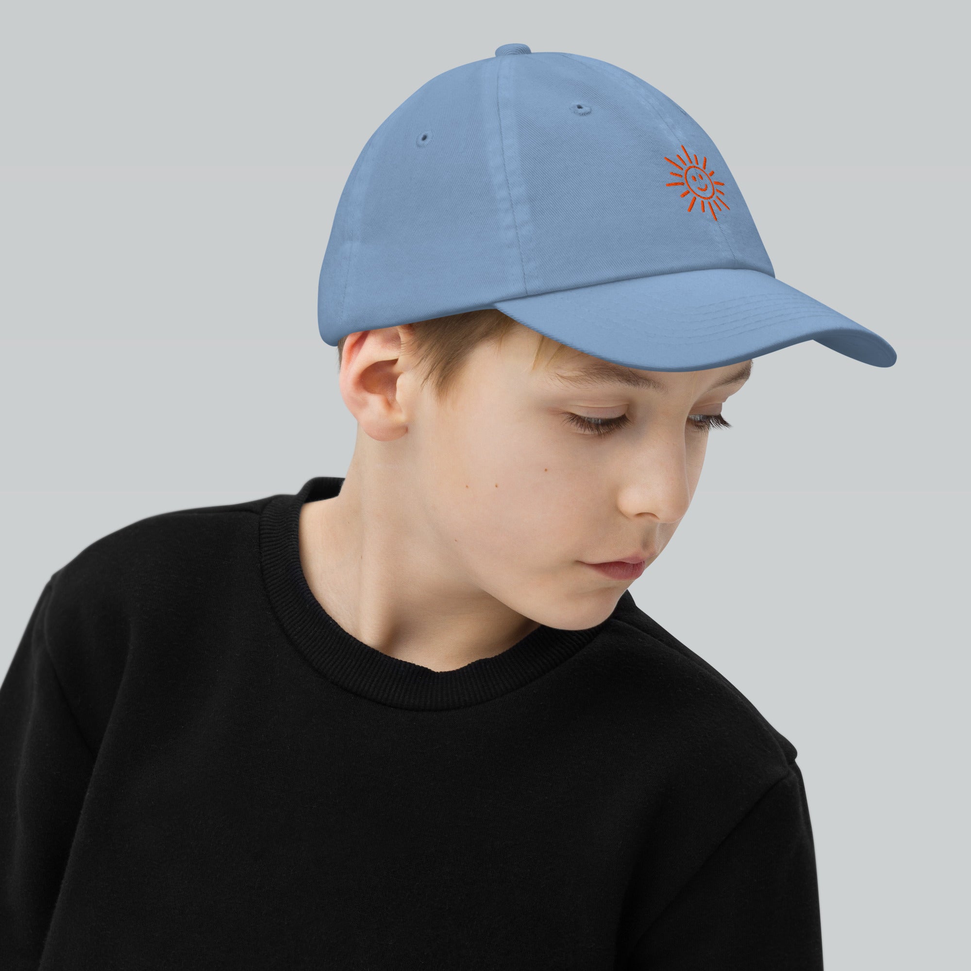 The Sunshine Project youth baseball cap in Blue, right side view