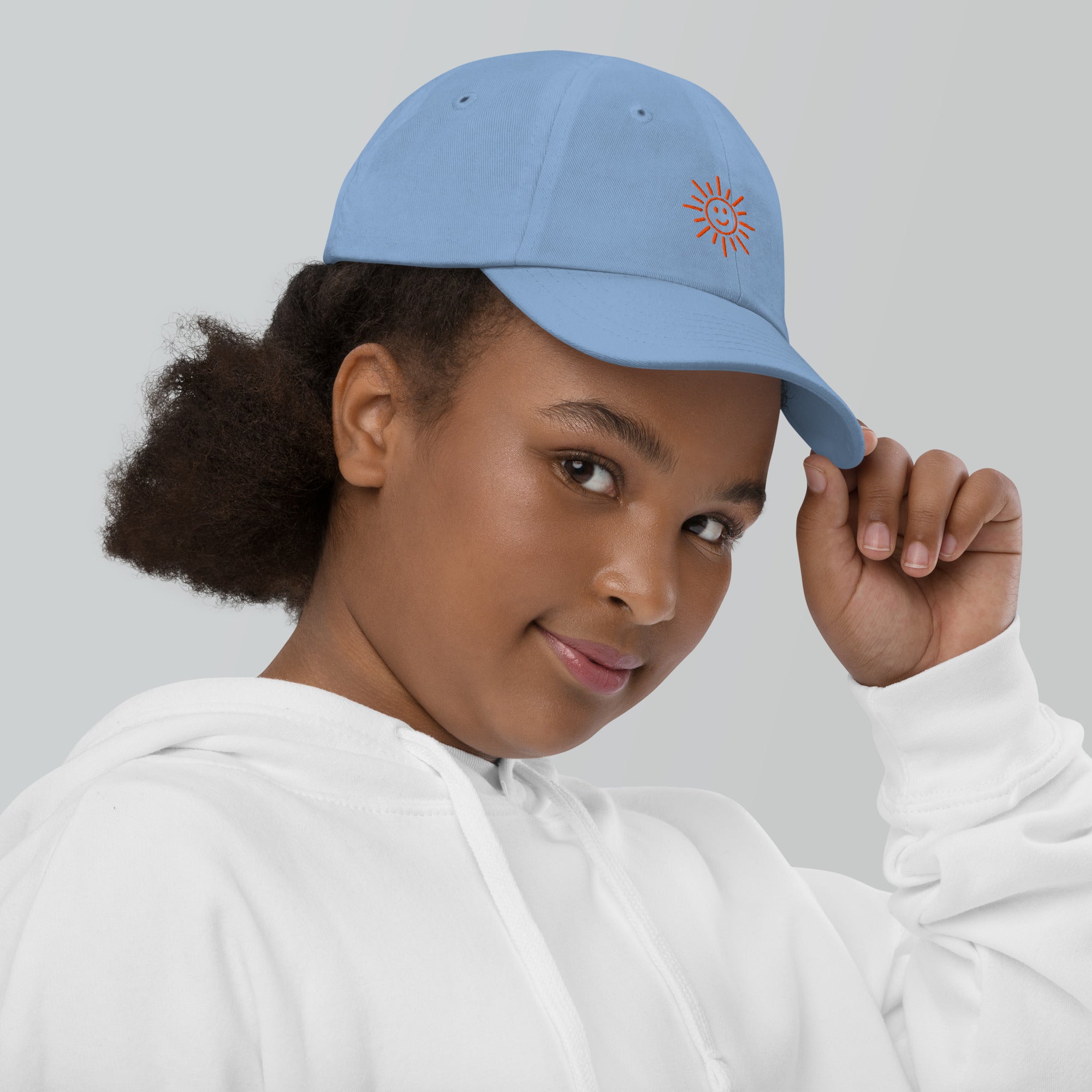 The Sunshine Project youth baseball cap in Blue, right side view