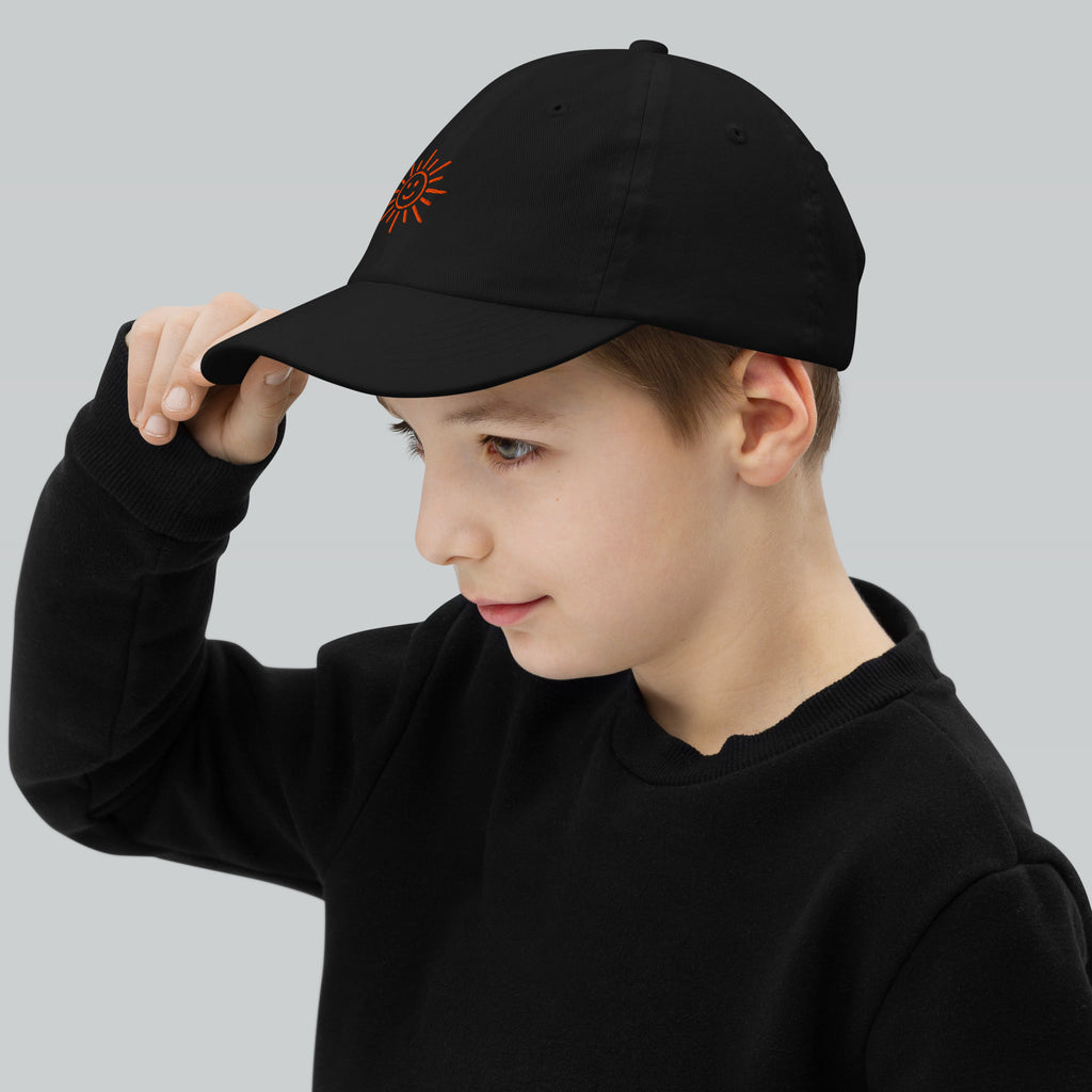 The Sunshine Project youth baseball cap in Black, left side view