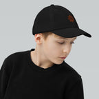 The Sunshine Project youth baseball cap in Black, right side view