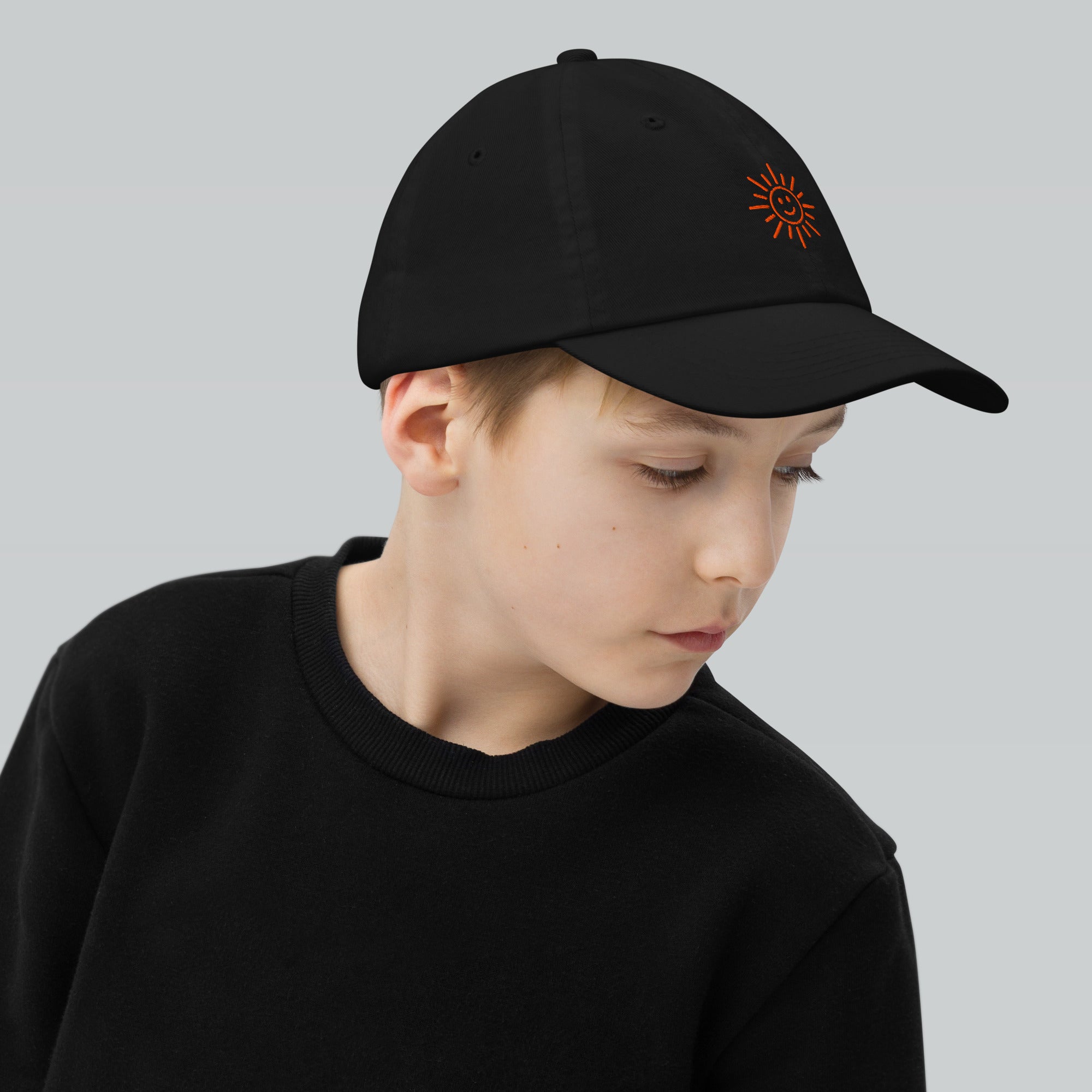 The Sunshine Project youth baseball cap in Black, right side view