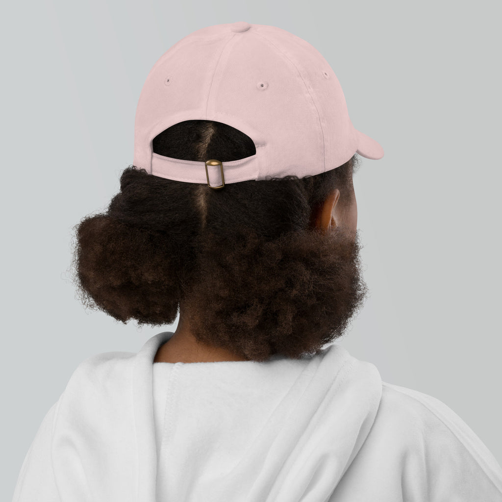 The Sunshine Project youth baseball cap in Pink, back view