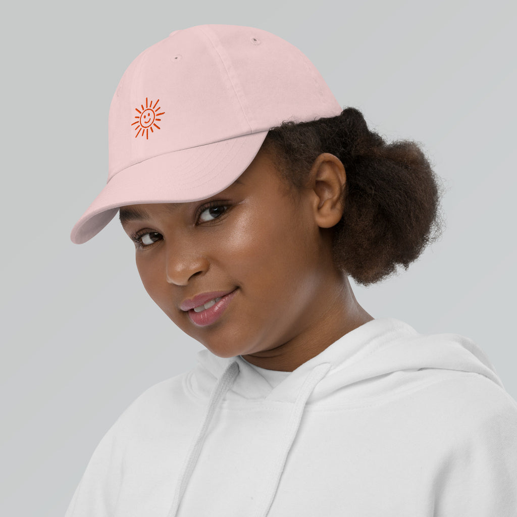 The Sunshine Project youth baseball cap in Pink, left side view