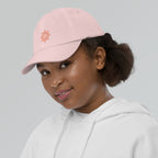 The Sunshine Project youth baseball cap in Pink, left side view