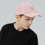 The Sunshine Project youth baseball cap in Pink, right side view