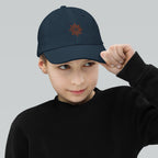 The Sunshine Project youth baseball cap in Navy, front view