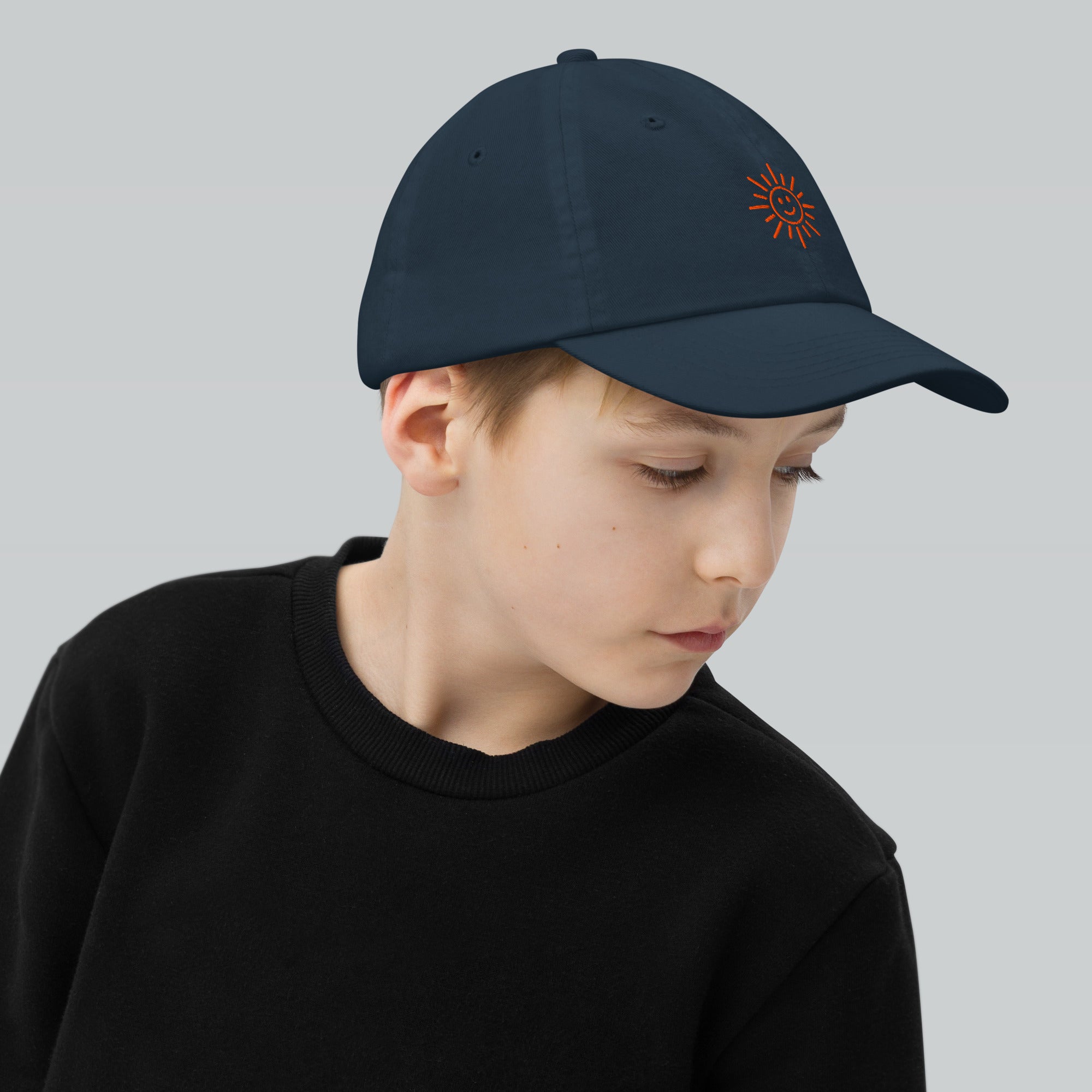 The Sunshine Project youth baseball cap in Navy, right side view