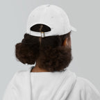 The Sunshine Project youth baseball cap in White, back view