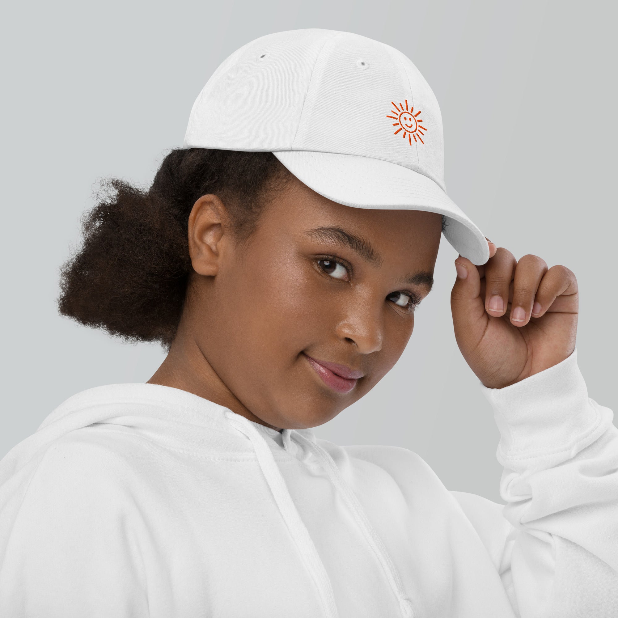 The Sunshine Project youth baseball cap in White, right side view